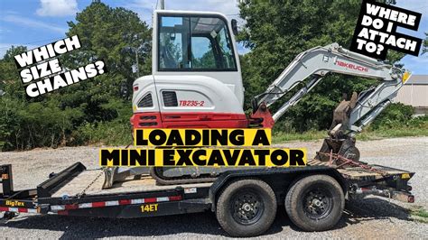 loading mini excavator on trailer|how to transport a mini excavator.